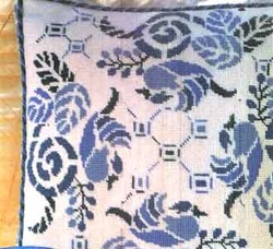 a cushion with japanese stencil pattern sewn on it